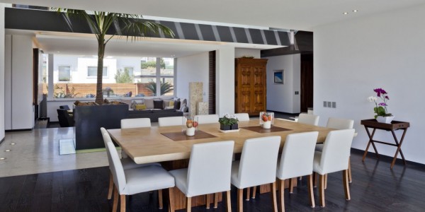Simple Neat Elegant Interior With Wooden Table And White Chairs Design