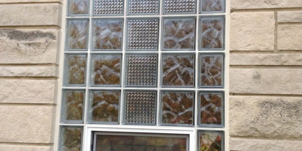 Close Up Of Cross Design In A Glass Block Window